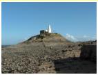 MUMBLES LIGHTHOUSE. Although on an island the lighthose can be reached when the tide is out.